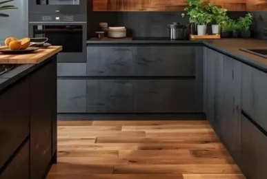 Modern kitchen with striking black cabinets and rich wooden accents, blending sophistication with warmth in a stylish space.