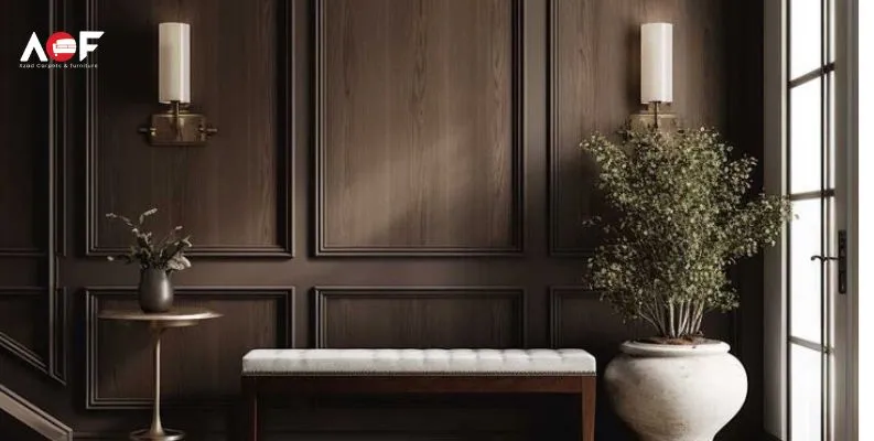 A large wooden wall panel features a bench and a vase, showcasing elegant wooden wall paneling in a cozy setting.